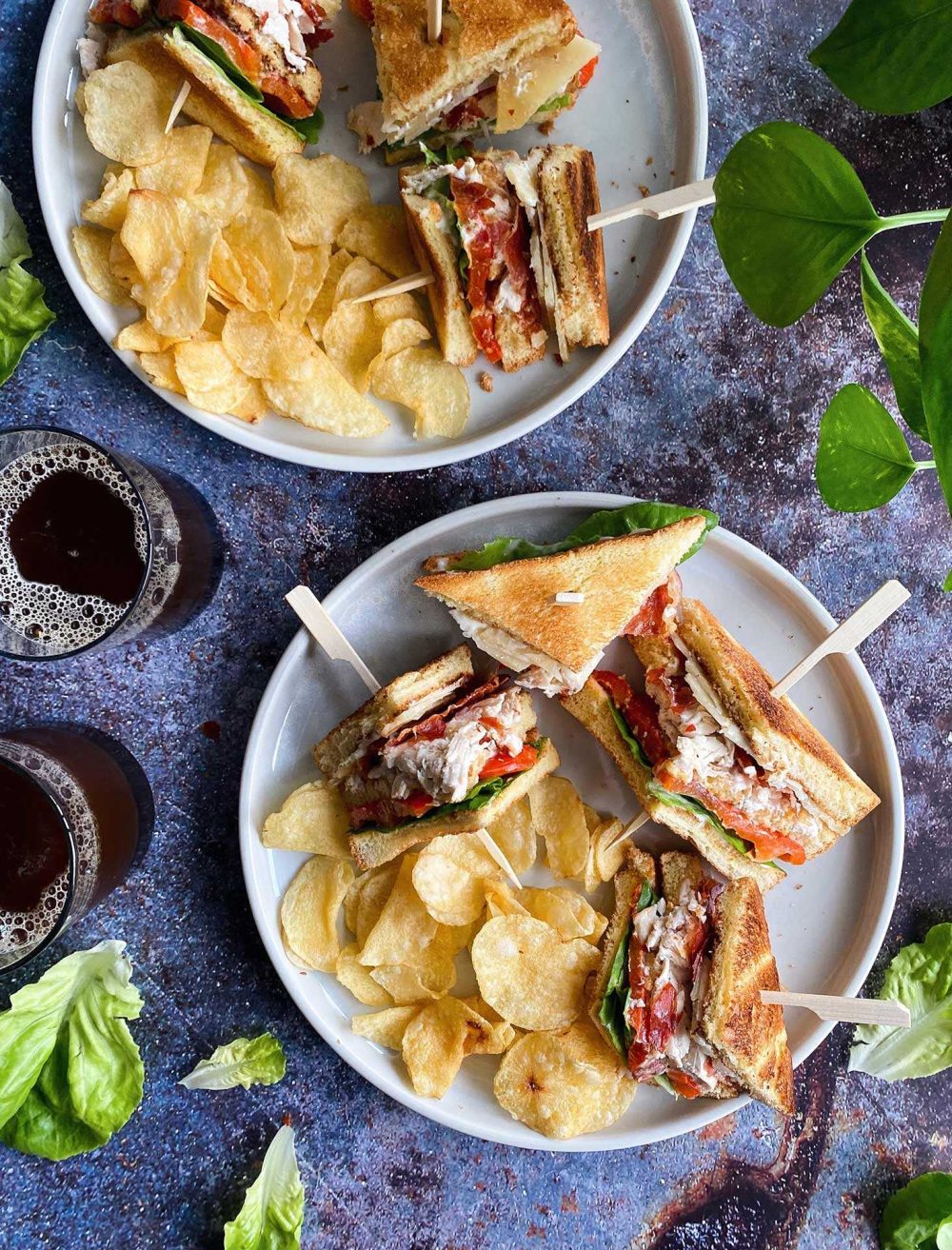 Club sandwich with prosciutto, roasted peppers and manchego cheese